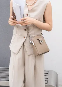 Genuine leather vertical phone bag for women, stylish crossbody shoulder bag with metal lock.