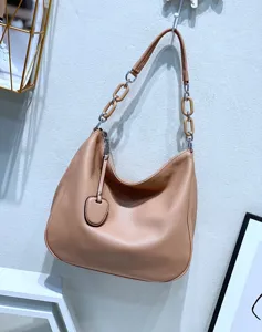 Casual genuine leather hobo shoulder bag detailed view, soft textured tote purse.