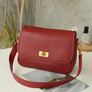 Vintage genuine leather shoulder bag for women, elegant retro cross-body bag with flap.