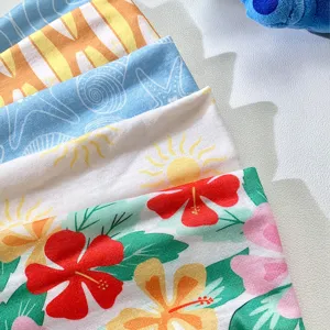 Summer Hawaiian vacation wide headband with hibiscus and shell print, versatile soft hair band.