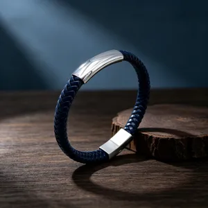 Men's royal blue braided leather bracelet detail view with titanium steel curved clasp.