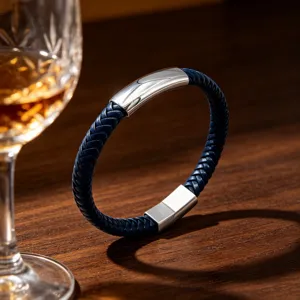 Men's royal blue braided leather bracelet with silver titanium steel magnetic clasp.