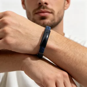 Men's blue braided leather bracelet with black titanium steel plate and magnetic clasp detail.