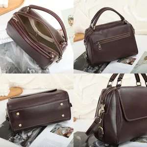 Retro brown genuine leather Boston bag, soft texture women handbag with shoulder strap and zip.