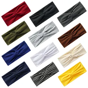 Close-up display of multi-color twisted elastic yoga headband fabric and color options.
