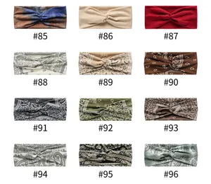 Detailed swatch of twisted yoga sports headbands featuring bohemian prints and colors.