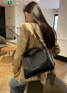 Soft leather boston bag for women, retro vintage shoulder crossbody handbag with wide strap.