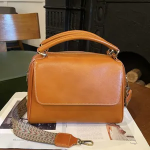 Vintage Brown Genuine Leather Boston Handbag with Retro Woven Wide Shoulder Strap Details