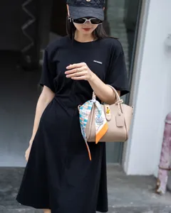 Stylish leather bucket bag for women, versatile crossbody shoulder handbag with chic silk scarf.