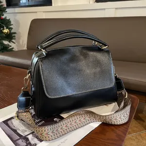 Soft leather Boston handbag with top handles and wide patterned strap for women vintage style