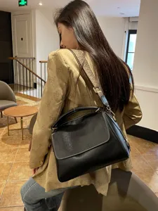 Black soft leather Boston bag for women, vintage crossbody shoulder bag with woven strap.