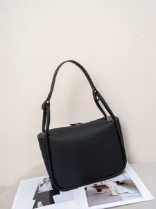 Black genuine leather shoulder bag for women, large capacity stylish tote bag for daily use.