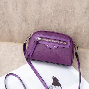 Purple leather crossbody bag, stylish women's shoulder bag with front zipper pocket.