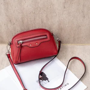 Red genuine leather crossbody bag for women, stylish small square shoulder handbag with zipper.