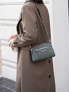 Stylish genuine leather crossbody bag for women, trendy commuter shoulder purse with strap.