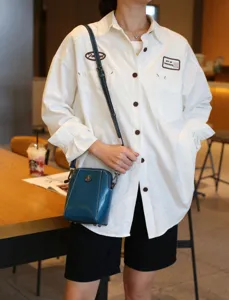 Sac bandoulière en cuir de vachette ciré pour femmes, élégant mini sac de téléphone coquillage.