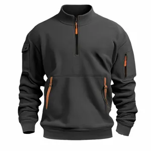 Men's dark grey stand collar long sleeve pullover with half zip and utility pockets.
