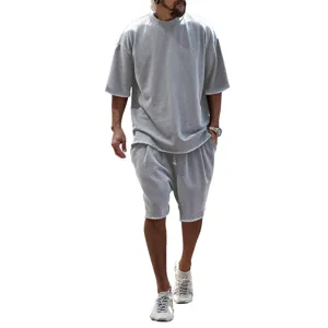 Men's summer casual oversized short sleeve t-shirt and matching shorts tracksuit set in grey.
