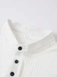 Men's ribbed knit vest detail shot featuring buttoned collar and soft breathable fabric.