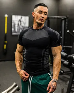 Men compression gym fitness t-shirt, short sleeve athletic training top for sports and workout.