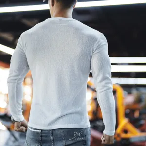 Men's white long sleeve ribbed t-shirt, slim fit crew neck top for fitness and sport.