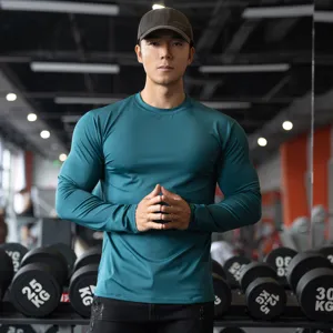 Men's long sleeve fitness t-shirt, solid color quick dry athletic workout compression top for gym.