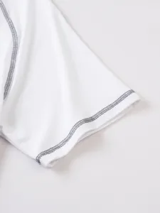 White short sleeve t-shirt sleeve cuff detail, contrast grey stitching, close up view