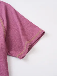 Close-up view of men's polo t-shirt short sleeve cuff with contrast stitching detail.