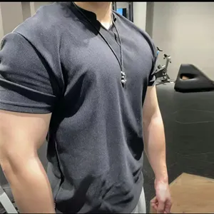 Men's textured dry-fit fitness t-shirt, breathable short sleeve athletic gym top for men.