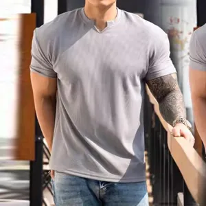 Men's textured quick-dry short sleeve t-shirt detail, breathable fitness athletic apparel view.