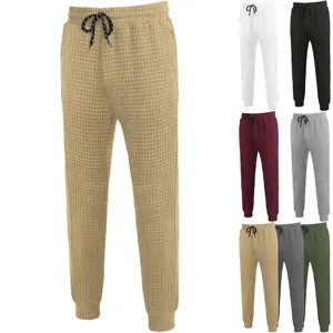Mens waffle knit casual trousers with drawstring, comfortable loose fit sweatpants for daily wear.