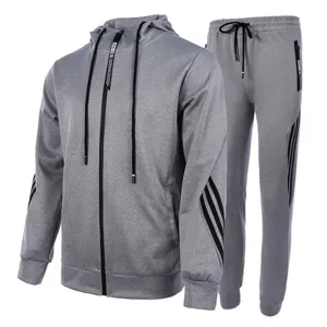 Men grey casual sports hoodie tracksuit with zip and classic three stripes design.