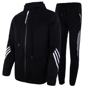 Detailed view of men's black tracksuit set, featuring hooded zip sweatshirt and pants.