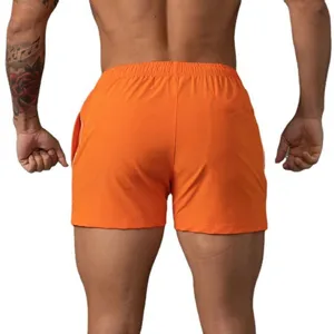 Herren Sportshorts Rückansicht Detail, leuchtendes Orange atmungsaktives Material fürs Fitness.