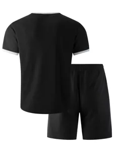 Men's casual waffle knit short sleeve t-shirt and shorts sportswear set in solid black.