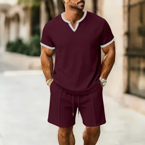 Men's waffle knit casual sportswear set with V-neck short sleeve t-shirt and matching shorts.