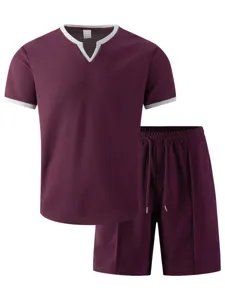 Waffle knit fabric detail of men's short sleeve V-neck top and shorts lounge set.