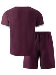 Detail view of the waffle knit short sleeve t-shirt and shorts set in maroon grey.