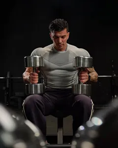 Men compression gym t-shirt detail scene, breathable fabric for high intensity workout.