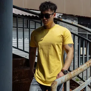 Men casual muscle fit short sleeve t-shirt fitness training streetwear apparel detail view.