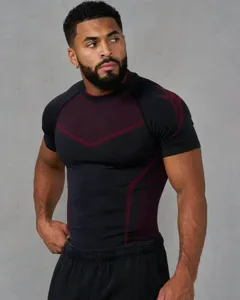 Men's athletic compression short sleeve fitness shirt detail showing breathable mesh fabric and fit.