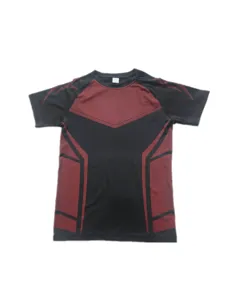 Detail view of men's athletic short sleeve compression shirt featuring black and red color block design.