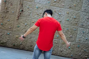Red fitness t-shirt back detail view, showing athletic muscle fit and casual sportswear style.