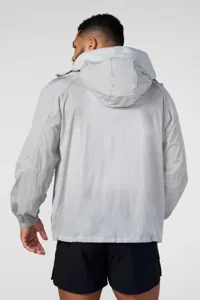 Back detail view of men's grey lightweight hooded windbreaker jacket, breathable fabric.