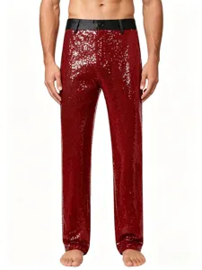 Close-up detail of shiny red sequin trousers for men, featuring a sleek black waistband.