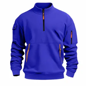 Detailed view of blue men mock neck half zip sweatshirt with multiple pockets design.