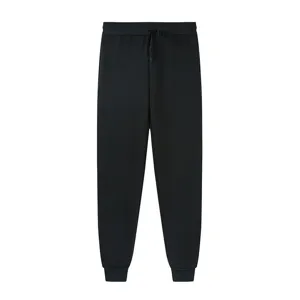 Detailed view of black sweatpants with drawstring waistband and elastic cuffs for comfort.