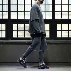 Men summer oversized casual short sleeve t-shirt and shorts outfit detail view display.