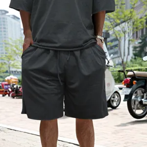 Men summer casual loose short sleeve t-shirt and shorts tracksuit dark gray sportswear set.