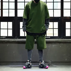 Men's casual loose summer streetwear short sleeve t-shirt and shorts two-piece set detail view.